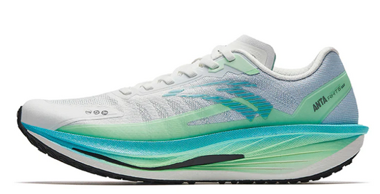 White and green running shoe on a white background