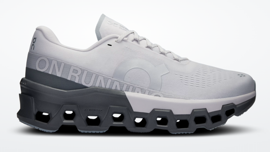 White running shoe with gray sole on a white background