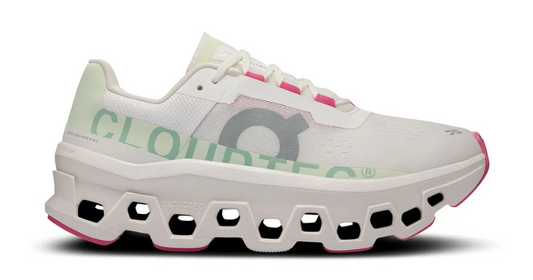 White running shoe with pink accents on a white background