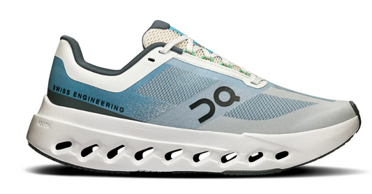 White and blue running shoe with 'Swiss Engineering' text on a white background