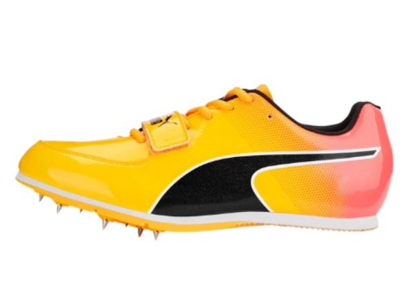 Yellow sprinter shoe with black and red accents on a white background