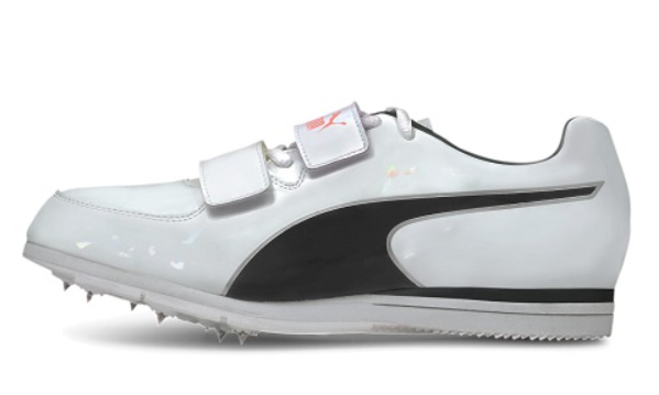 White and black track shoe with cleats on a white background