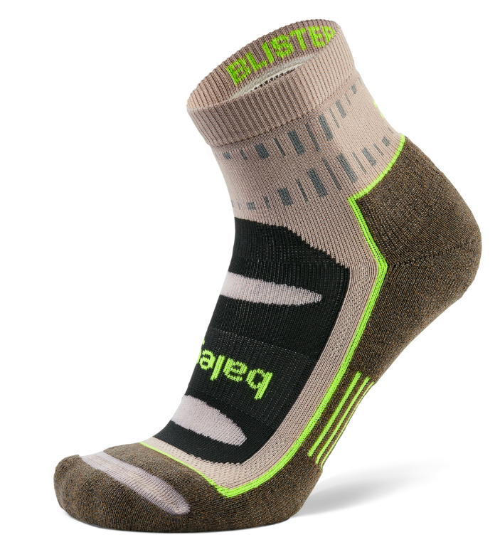 Brown and gray sock with green accents on a white background
