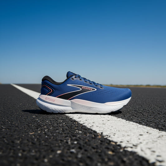 Blue running shoe with white sole on a white background