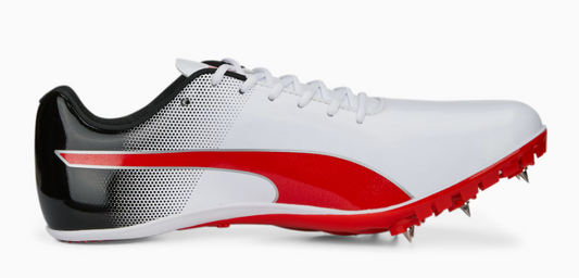 White running shoe with red accents and spikes on a white background