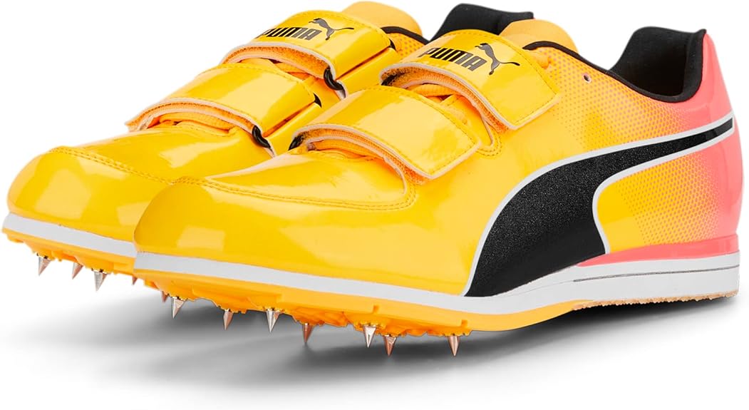 Yellow and black running shoes with spikes on a white background