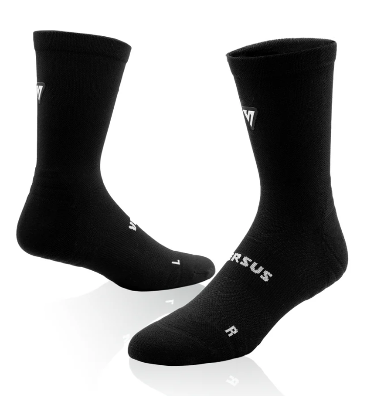 Two black socks with a brand logo on a white background