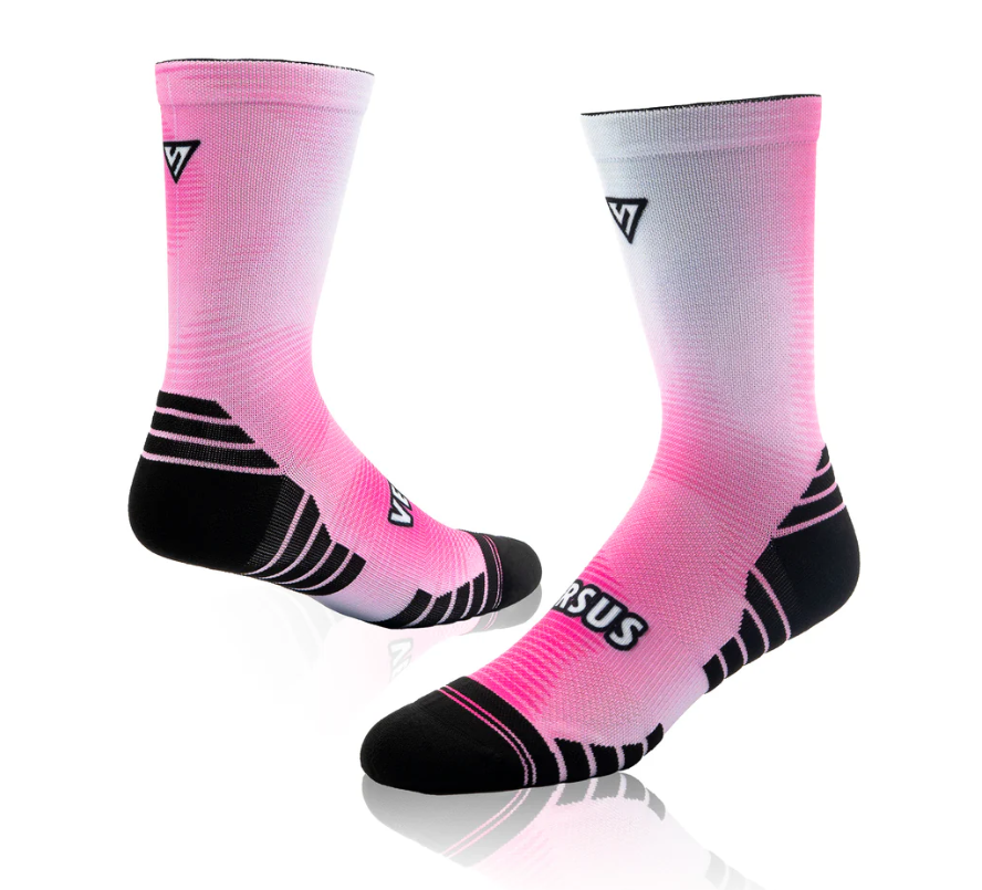 Pink and black socks with a brand logo on a white background