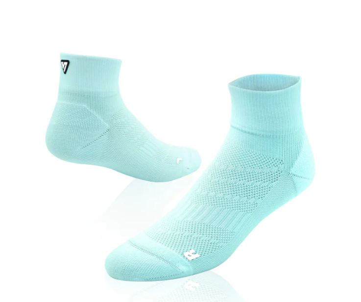 Pair of light blue socks on a white background