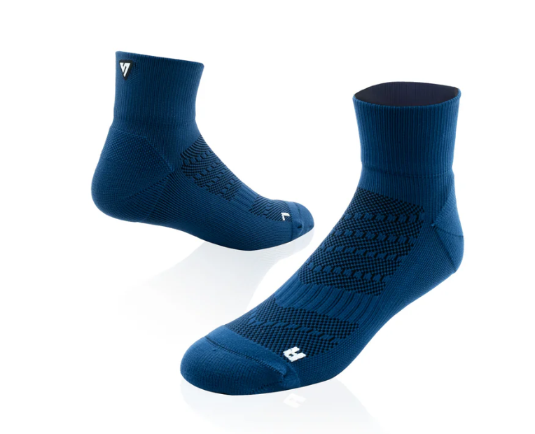 Pair of blue socks on a white background